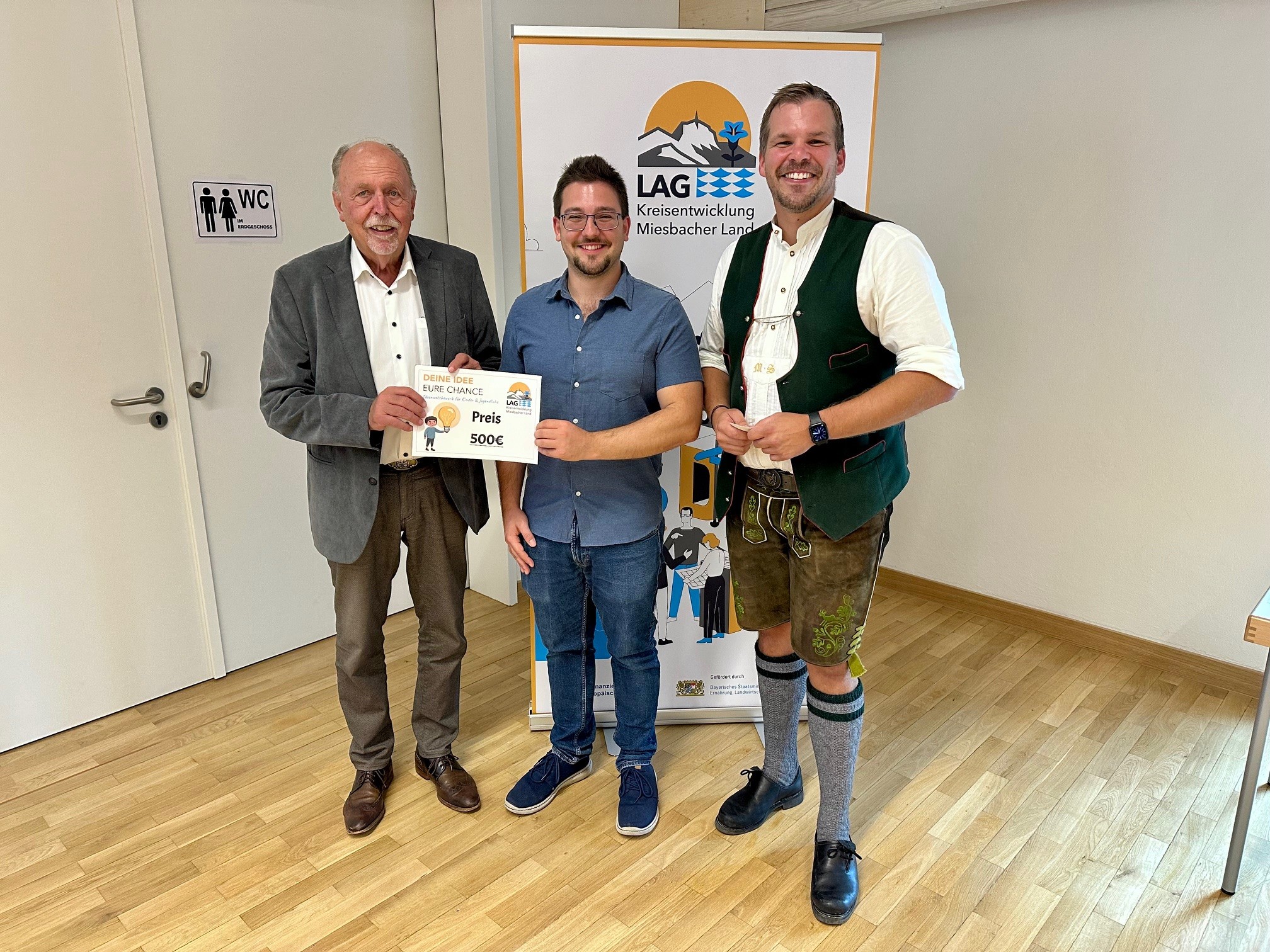 Ideenwettbewerb Mang4all Gewinnerurkunde Übergabe